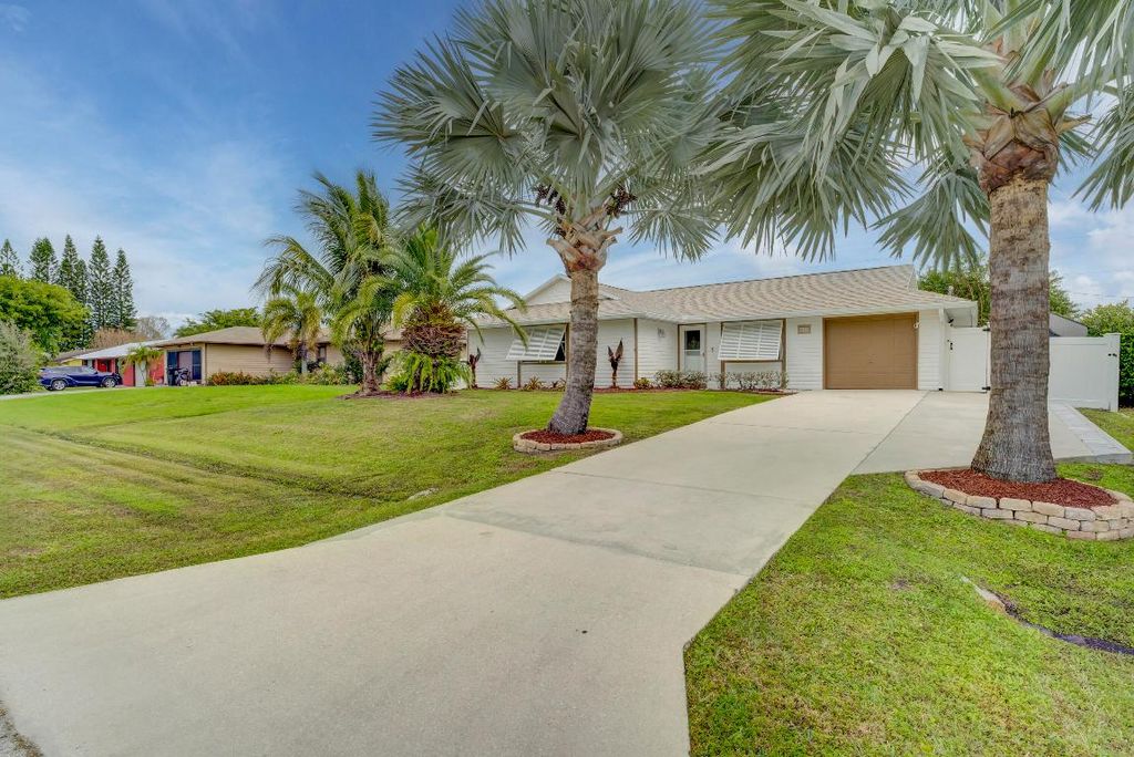 Photo of 637 SW Granadeer Street, Port Saint Lucie, FL 34983 (MLS # R10951792)