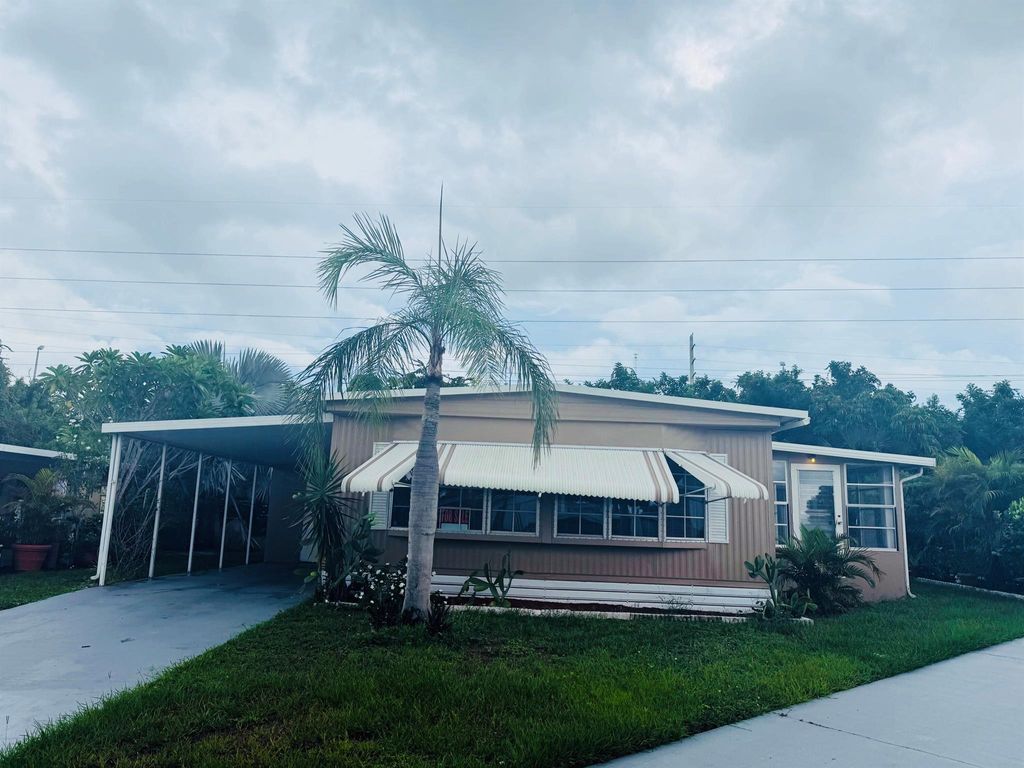 Photo of 18 Cozumel Lane, Port Saint Lucie, FL 34952 (MLS # R11123128)