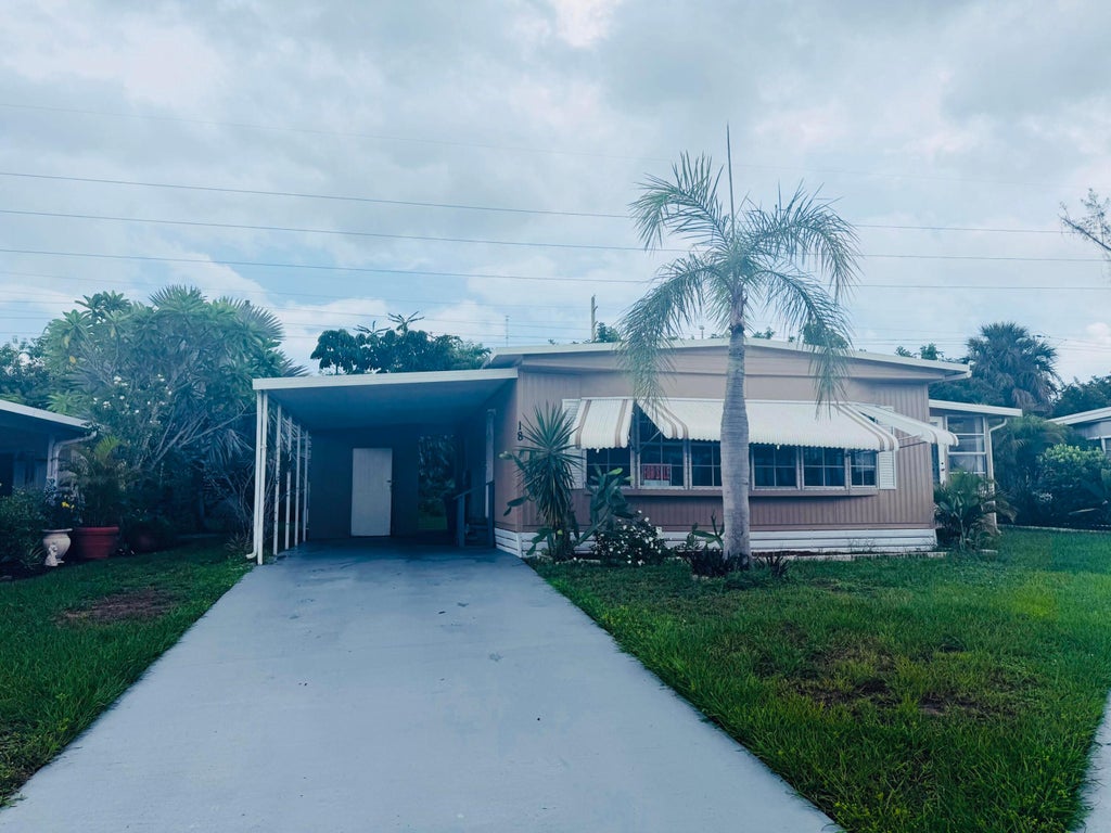 Photo of 18 Cozumel Lane, Port Saint Lucie, FL 34952 (MLS # R11123128)