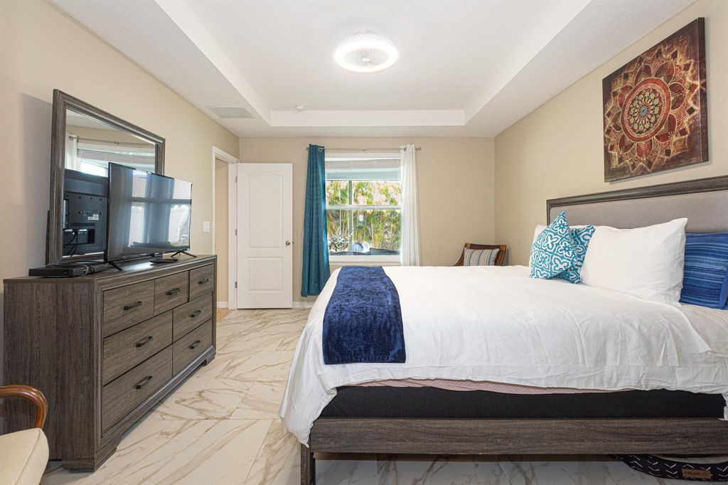 Photo of 701 SW Mccomb Avenue, Port Saint Lucie, FL 34953 (MLS # R11039822)