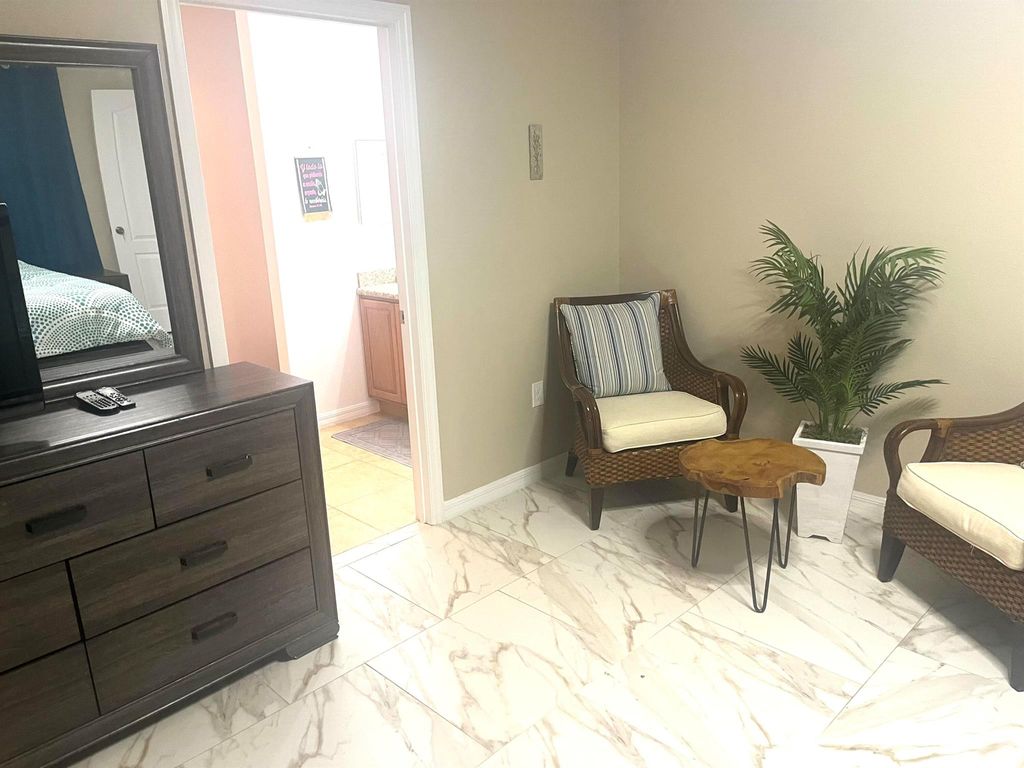 Photo of 701 SW Mccomb Avenue, Port Saint Lucie, FL 34953 (MLS # R11039822)