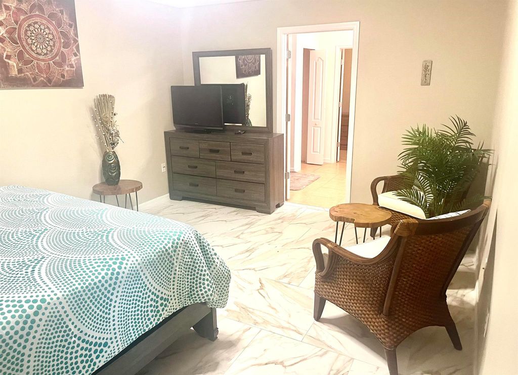 Photo of 701 SW Mccomb Avenue, Port Saint Lucie, FL 34953 (MLS # R11039822)