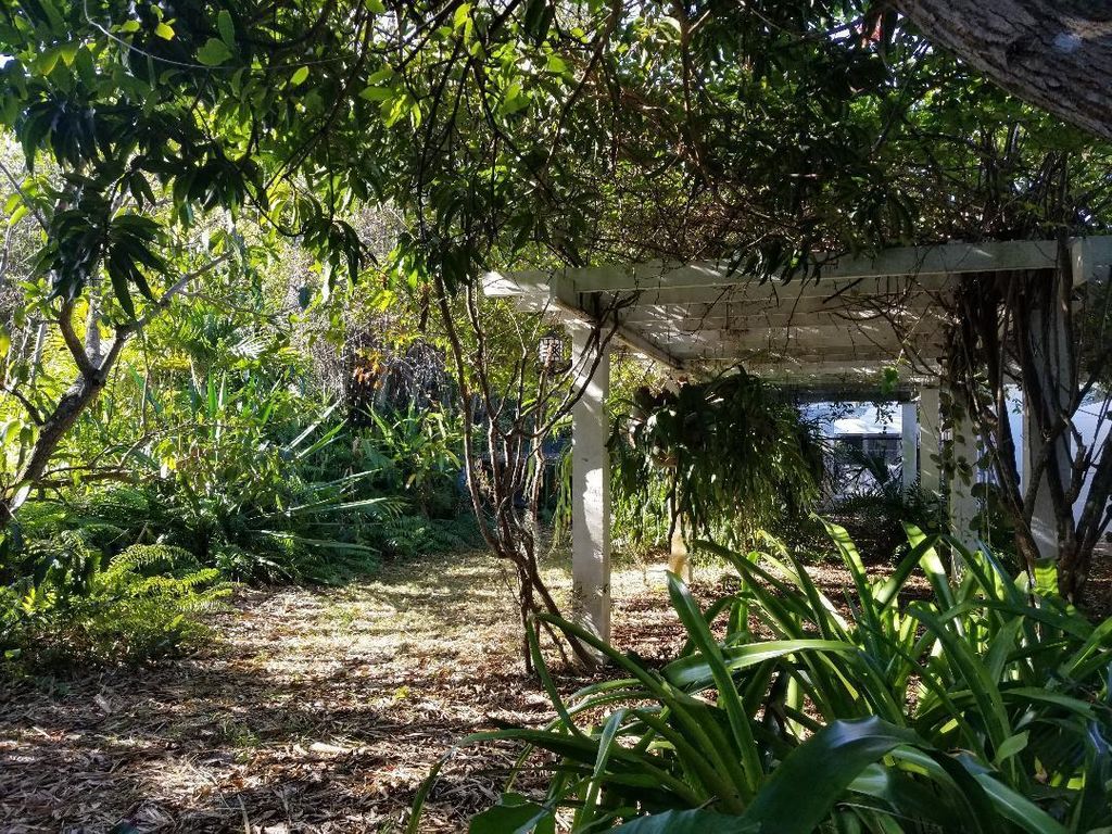 Photo of 12345 S Indian River Drive, Jensen Beach, FL 34957 (MLS # R10769680)