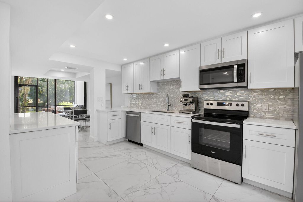 Photo of 3707 Bridgewood Drive, Boca Raton, FL 33434 (MLS # B26003490)