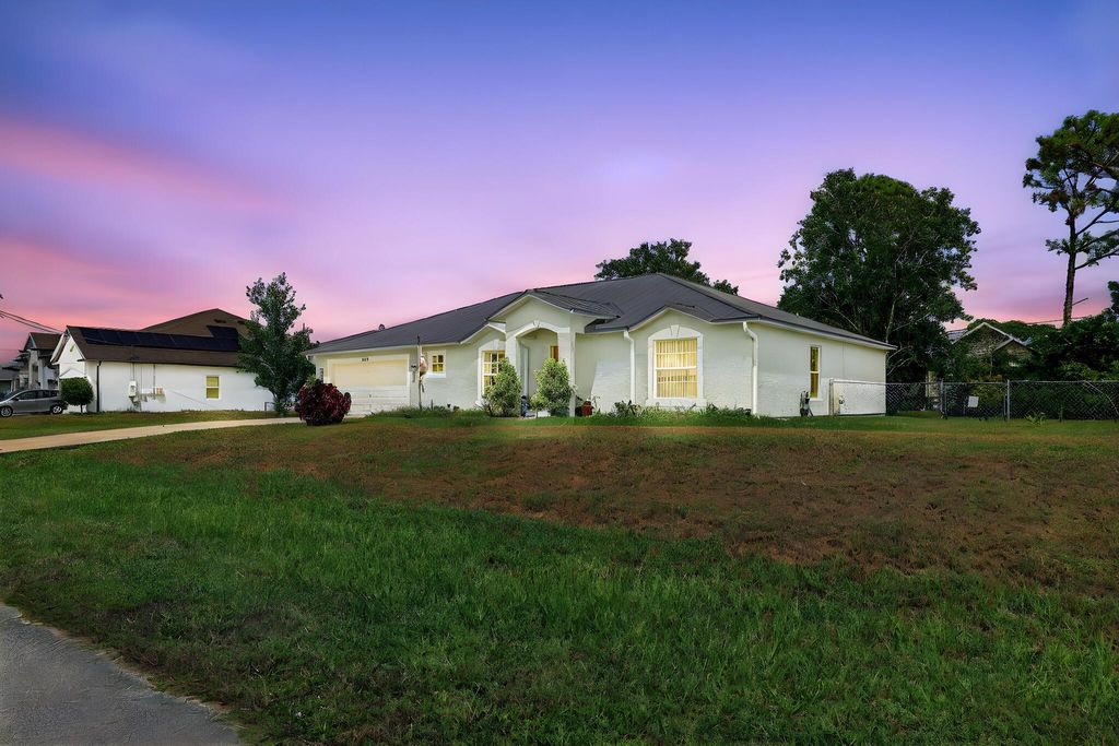 Photo of 4221 SW Iliad Street, Port Saint Lucie, FL 34953 (MLS # R11119103)