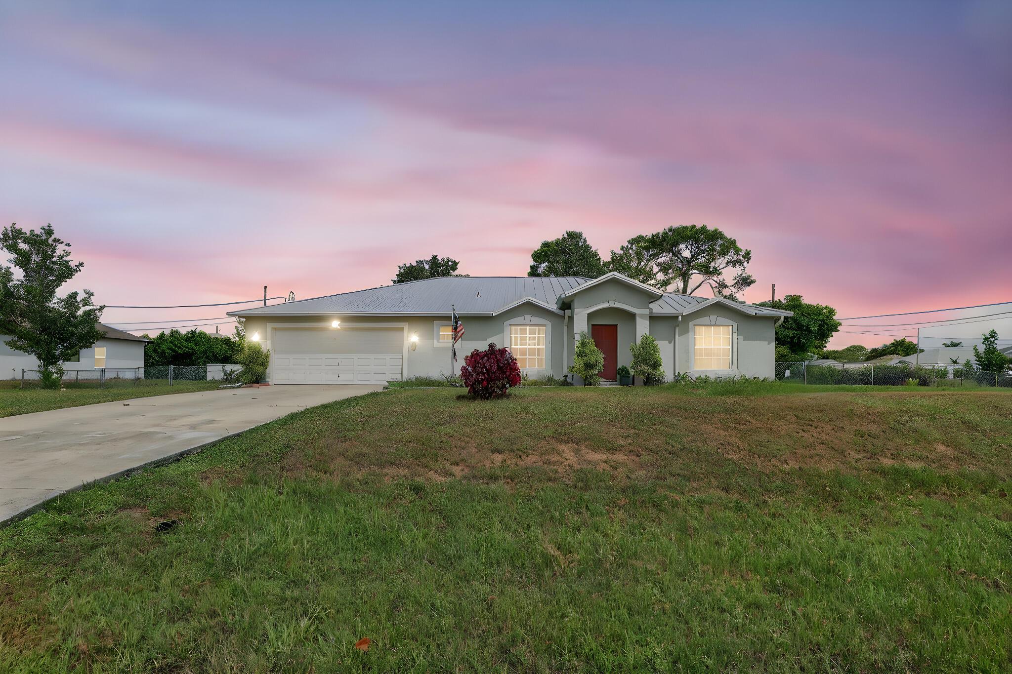 Welcome to this spacious 4 bedroom, 2 bathroom home sitting proudly on an oversized double lot totaling 21,250 sq. ft. With plenty of room inside and out, this property offers the perfect blend of comfort, durability, and potential. The home features a 2018 metal roof, giving peace of mind for years to come. Inside, you'll find a functional layout with generous living spaces, four well-sized bedrooms, and two full bathrooms ideal for families or those who love extra space. Step outside and enjoy the expansive yard perfect for a garden, outdoor entertaining, or even adding a pool. With so much land, the possibilities are endless. Don't miss the opportunity to own a property with this much space and versatility. Close to shopping, restaurants, and medical facilities.