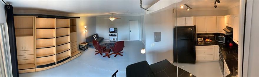 This lovely top floor STUDIO is just WAITING FOR YOU! Featuring a large balcony with views of the downtown city skyline and East Canal. Modern kitchen features eat-in bar and has plenty of storage. Queen size Murphy Bed with shelving and extra cupboard storage. Concrete floors in main area leave you the opportunity to decorate to your choice. Large walk in closet. Laundry facilities available on same floor. 2 pets under 20lbs allowed and dockage available up to 50ft vessel. River Reach is a gated tropical island community on the New River with amenities including: Gym, 3 pools & 2 tennis courts. Minutes from beaches, entertainment & FLL airport.  Future projects include concrete restoration, new hurricane impact windows and sliders, new balcony railings and new paint colors for community.