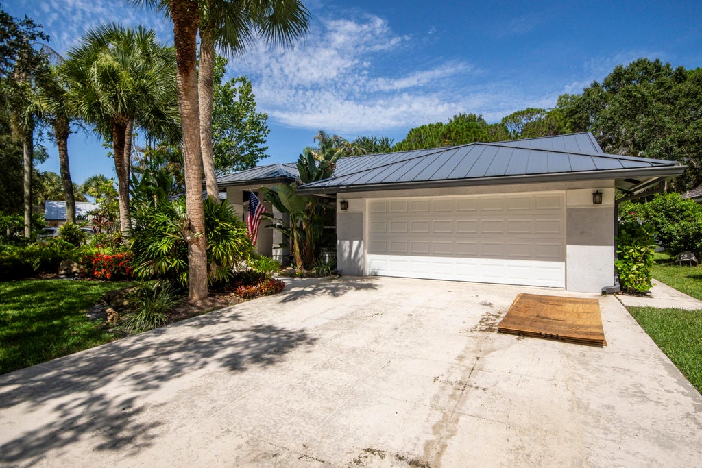 Photo of 18901 Misty Lake Drive, Jupiter, FL 33458 (MLS # B26069501)