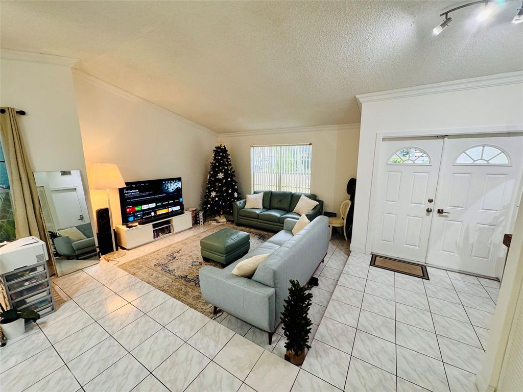 Photo of 9673 NW 45th St, Sunrise, FL 33351 (MLS # F10542072)