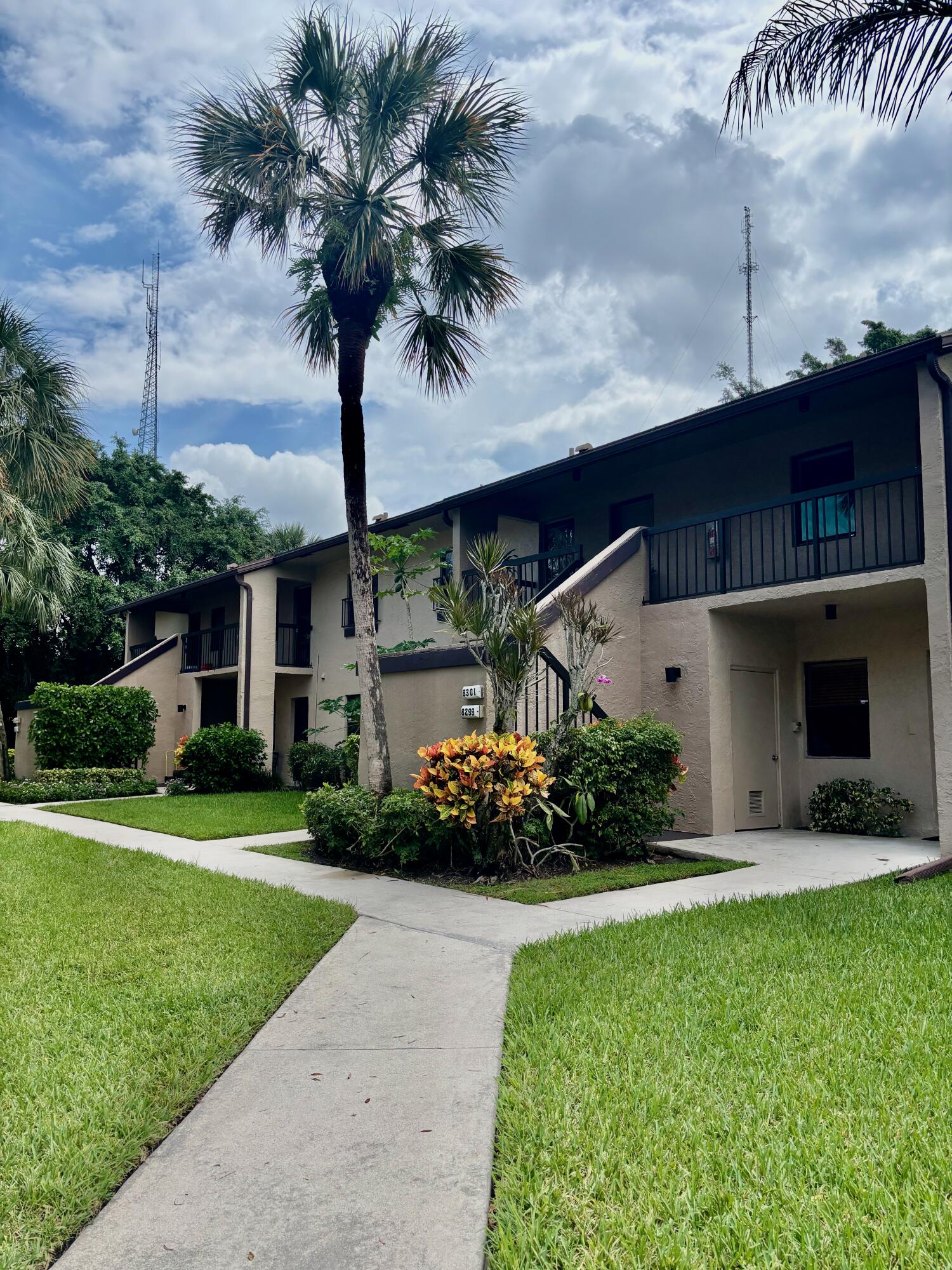 This immaculate and sunny first floor end-unit condo has two en suite bedrooms with walk-in closets. The second bedroom has sliding glass doors overlooking the lake. Neutral porcelain marble-like tile throughout. Newer washer and dryer. Impact sliding doors in Florida Room. Recently renovated primary bathroom with quartz countertops. Unit has been freshly painted..Enjoy the serene views of the lake from the back patio. JUST 3-4 MILES TO I95 AND TOWN CENTER MALL. FL. TURNPIKE LESS THAN 1 MILE. PICTURESQUE DOWNTOWN SHOPPING AREAS. FINE DINING OF EVERY KIND. GREAT BEACHES TOO. FLORIDA ATLANTIC UNIVERSITY JUST 3 MILES AWAY. ''A'' RATED SCHOOLS. PERFECT LOCATION!