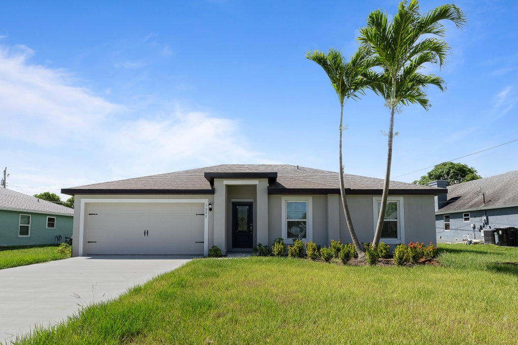 Photo of 1597 SE BERKSHIRE Boulevard, Port Saint Lucie, FL 34952 (MLS # B26083701)