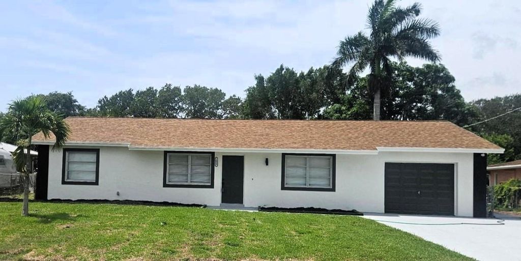 Photo of 1049 Coral Drive, Boynton Beach, FL 33426 (MLS # F10511203)