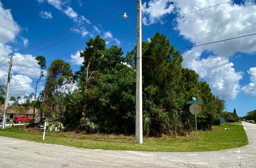 Photo of 2097 SW Burlington Street, Port Saint Lucie, FL 34984 (MLS # R10850380)