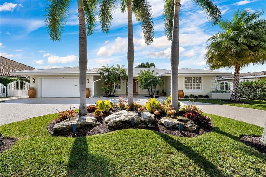 Hurry Hurry to be the First to Tour This Stunning, Perfectly Appointed Waterfront Property, Located in the Quiet and Lovely 'Landings" Community. A Boater's Delight with 85' on the Water, and a 20 Thousand lb. Boat Lift to Make Caring for Your Yacht a Pleasure! Immaculate Curb Appeal. Beautiful Floor plan That Makes Perfect Sense and Offers Great Garden/Pool Views From Almost Every Room! Attractive Built-in Office off the Family Room and a Very Charming Kitchen that Overlooks a Gorgeous Covered Lanai and Pool Area, Decorated With a Unique Dolphins Waterfall, Plus a Spa Pool. Plenty of Lounging Area to Spend your Days and Evenings Outdoors! Bedrooms Offer Nice Size Closets and Custom Window Treatments. All Impact Windows. Get it Now Before Someone Else Does!