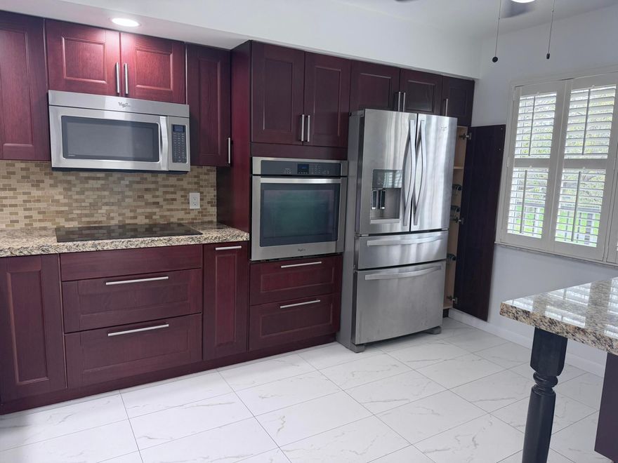 Enjoy the beautiful golf course views from this stunning remodeled 2 bed/ 2-bathroom in the community .This unit has been totally remodeled and features an elegant -contemporary kitchen with STAINLESS STEEL appliances, nice clean TILE flooring throughout, NEW remodeled  bathrooms, and the convenience of a WASHER & DRYER in the unit. Spacious WALK IN CLOSET with plenty of storage. Located in a 55+ active community that provides a vibrant and enjoyable lifestyle. A perfect blend of style, comfort, and location—don't miss this opportunity!