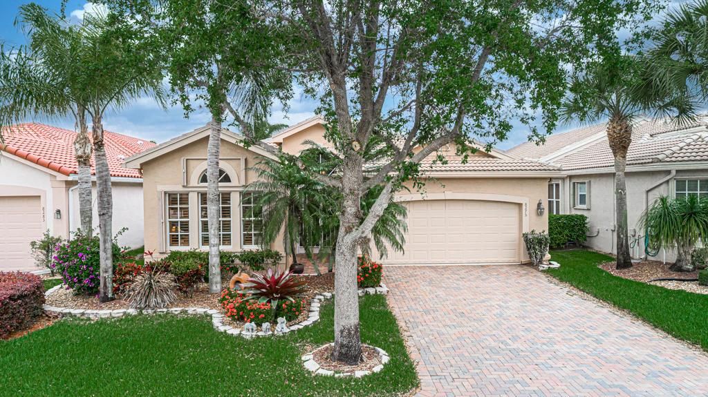 Photo of 8275 Seahorse Cove Boulevard Blvd, Lake Worth Beach, FL 33467 (MLS # R10711851)