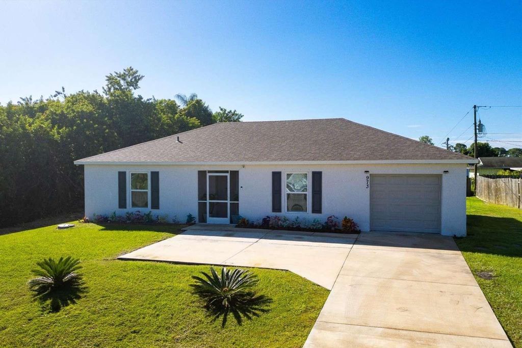 Photo of 973 NW Bayshore Boulevard, Port Saint Lucie, FL 34983 (MLS # F10532539)