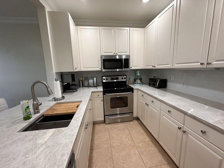 Stunning Updated Townhome with 1938sq' under air in desirable Abacoa! The first floor has a spacious living area with wood flooring and a half bath that has a floating vanity with a quartz countertop and a new marble floor. The second floor has a large living room and updated kitchen, breakfast bar, formal dining room, stainless steel appliances, and half bath with floating vanity and new marble floor. The third floor consists of three bedrooms, two full bathrooms, floating vanities, new quartz countertops, tile flooring, and light fixtures. The community has a pool and clubhouse. Enjoy the convenience of living in Abacoa, close to I-95, Roger Dean Stadium, A-rated schools, short drive to Beaches and shopping! Don't miss this very clean, updated townhome! Also for Sale