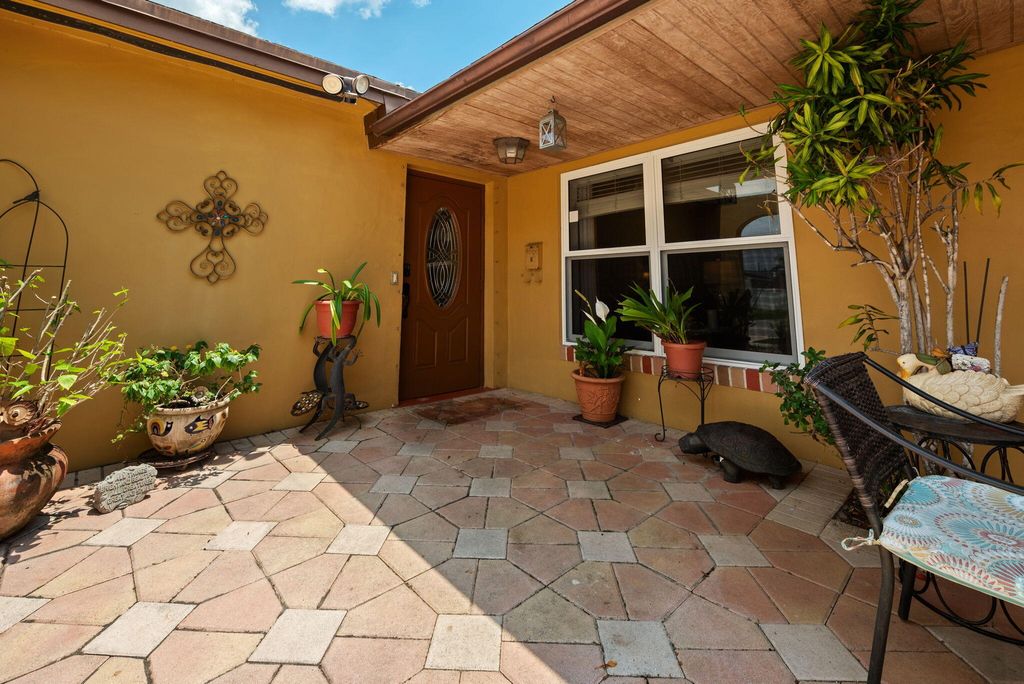 Photo of 8350 NW 23rd Street, Pembroke Pines, FL 33024 (MLS # B26024758)