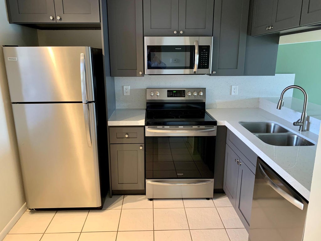 Photo of 10501 W Broward Boulevard #405, Plantation, FL 33324 (MLS # B26080465)