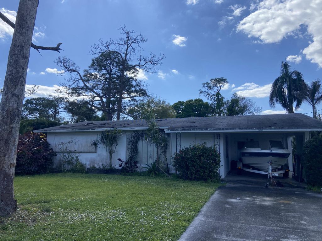 Photo of 1006 SW 29th Terrace, Palm City, FL 34990 (MLS # R10963820)