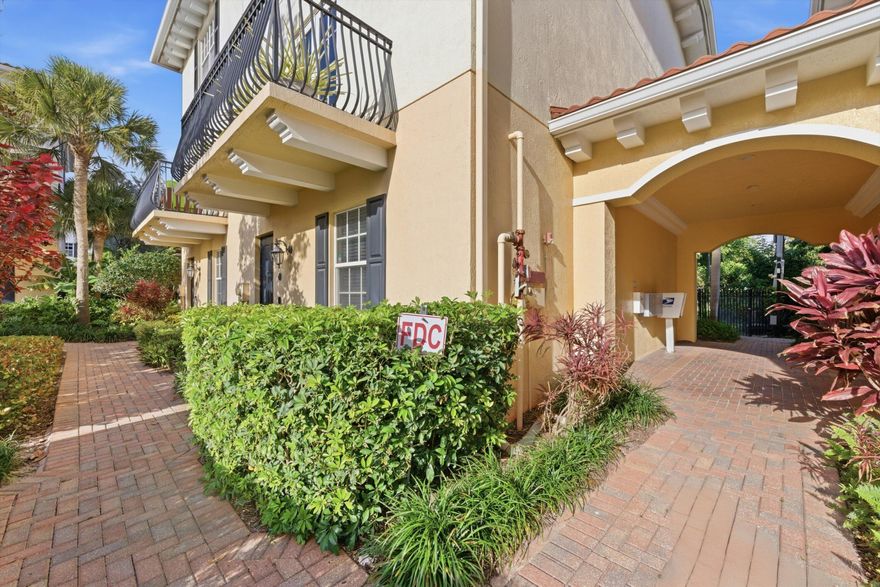 This three-level, triple-split townhouse boasts over 2,000sf, a bedroom and bathroom on EACH floor, and full hurricane protection!   The garage, laundry room, a bedroom, and full bathroom are on the first floor.   The second floor features a spacious family room, guest bedroom with large walk-in closet, full bath, and an open kitchen with white cabinetry and granite countertops.   The entire third floor is a private primary suite with dual closets and a beautifully updated bath. Enjoy a rare private entry from Maryland Drive.   Walk to a new shopping center anchored by Trader Joe's (coming soon) and minutes to The Park West Palm, beaches, PBI, and downtown.