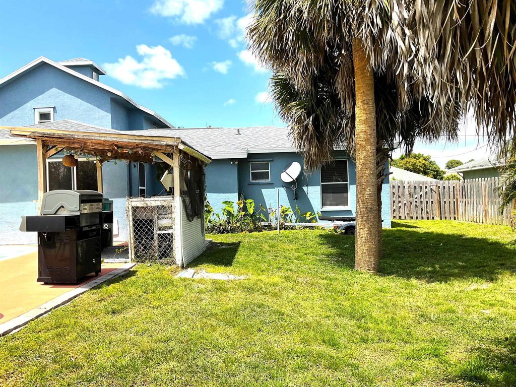 Photo of 2310 SE Harrington Avenue, Port Saint Lucie, FL 34952 (MLS # R11083684)