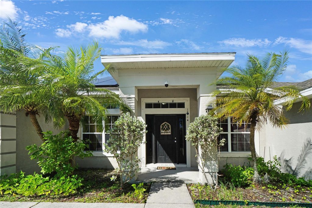 Photo of 1401 SW Bougainvillea Avenue, Port Saint Lucie, FL 34953 (MLS # F10434895)