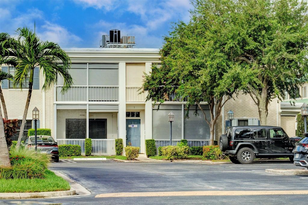 Photo of 140 Cypress Club Drive #414, Pompano Beach, FL 33060 (MLS # B26022918)