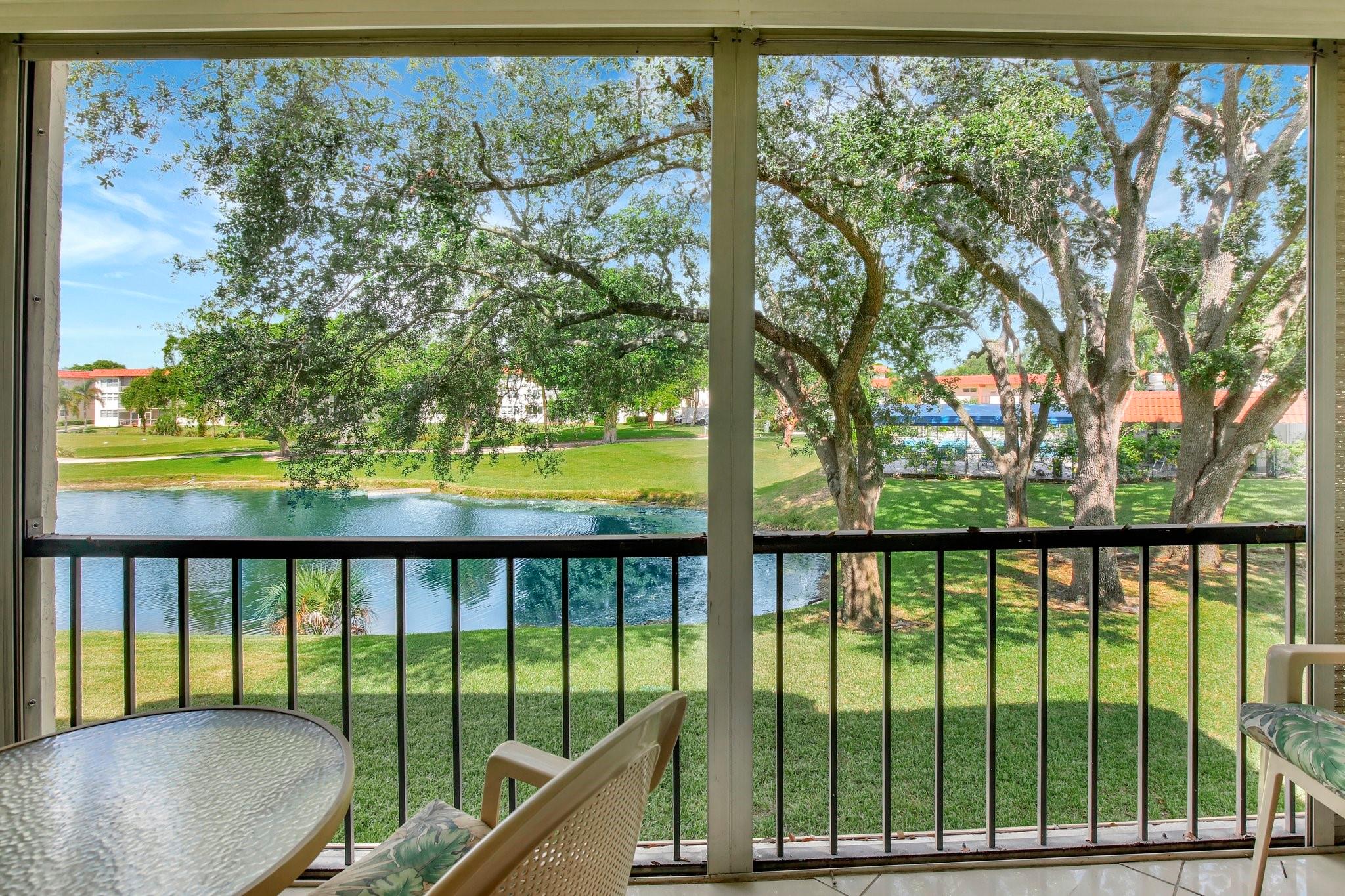 Bright Full Two Bedroom Corner With Water View On Par 3 Golf Course-Large Tiles Throughout The Condo-Upgraded White Kitchen With Granite Counters and Large Breakfast Bar-Can Be Turnkey For New Owner-Tastefully Painted and Decorated-Paid up rec lease-May Have Small Pet To 20 Lbs-Cable TV and Internet Included-Free golf, 14 tennis courts, 7 pools, theater, fitness center, restaurant, 24-hour security, Assoc. represents housing for older persons authorized (HOPA).. *** IMPORTANT! See Broker Remarks below for occupancy qualifications.