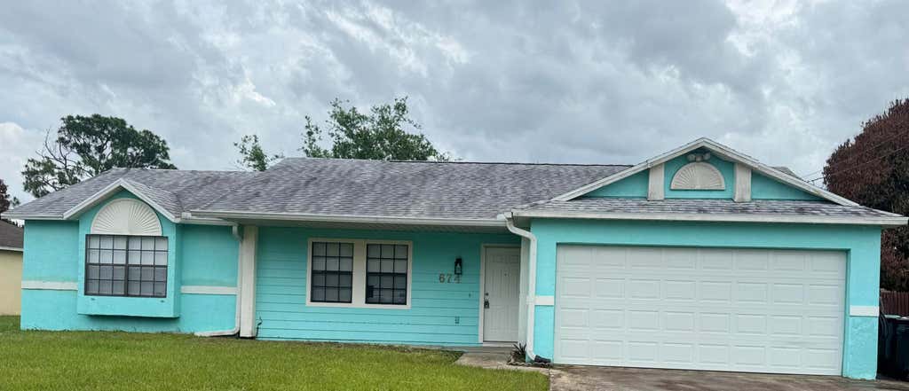 Photo of 674 SW Violet Avenue, Port Saint Lucie, FL 34983 (MLS # B26046664)