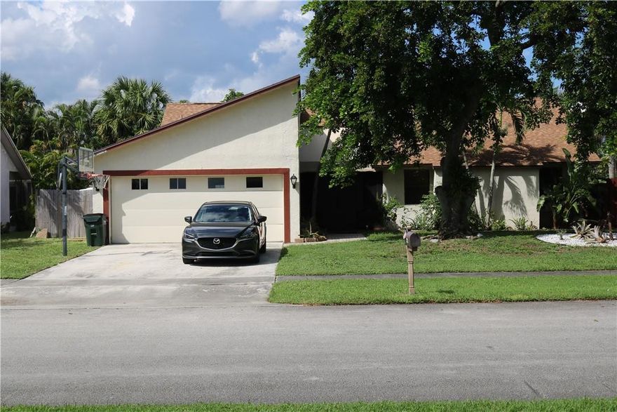 MAGNIFICENT EAST DEL RAY BEACH LOCATION in TROPIC PALMS community. Make this your own and bring your designer hat on! No HOA. Enough space to park your Boat inside the fence on the left side of house. Spacious 3 Bedroom/2 Bath Home, screened-in pool, 2-car garage, all tile, fenced yard. Re-roof in 2018. Appliance Maintenance Contract on appliances. Close to shopping, restaurants,  main highways, Boca Raton Community High School and the Beach is just a few minutes away. Pls CLICK show assist for a property tour! SOLD "AS IS".