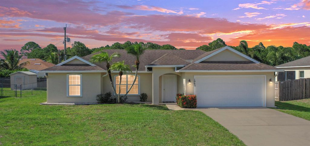 Photo of 1065 SW Aswan Avenue, Port Saint Lucie, FL 34953 (MLS # R10997789)