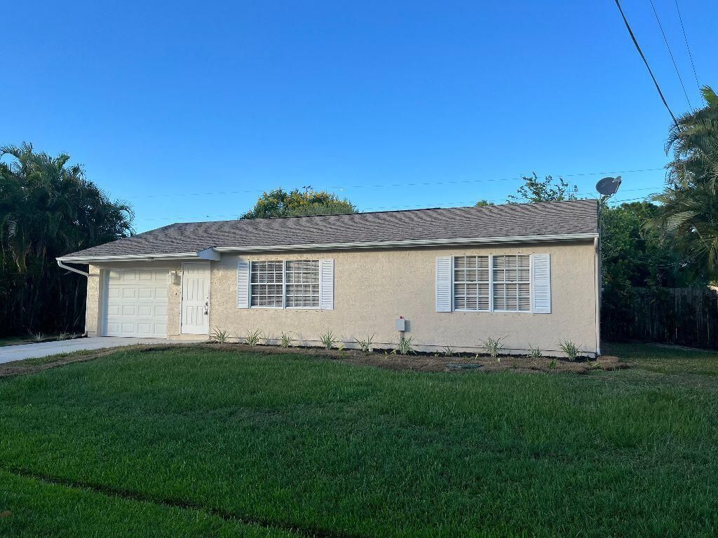 Photo of 2289 SE Friendship Street St, Port St Lucie, FL 34952 (MLS # R10816714)