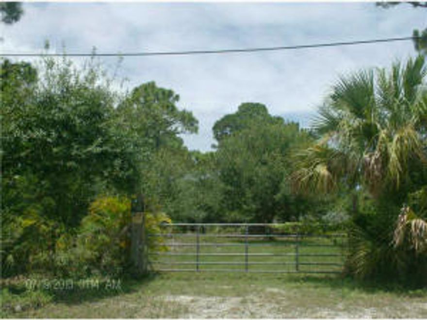 Huge 2.85 acres fenced in vacant lot for sale. Not a foreclosure/short sale. in the lovely Lakewood Park area! This lot has been partially cleared for the perfect build! Put your imagination to use and create the home of your dreams. Enjoy the lovely Florida year round or for just a season...you decide!!