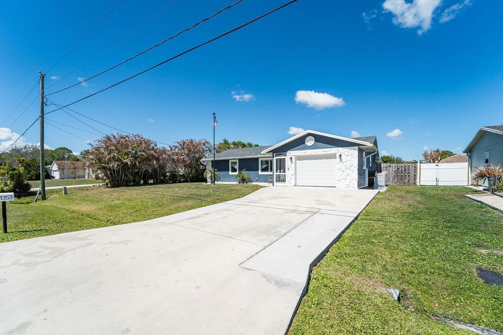 Photo of 1353 SW Gastador Ave, Port Saint Lucie, FL 34953 (MLS # B26000980)