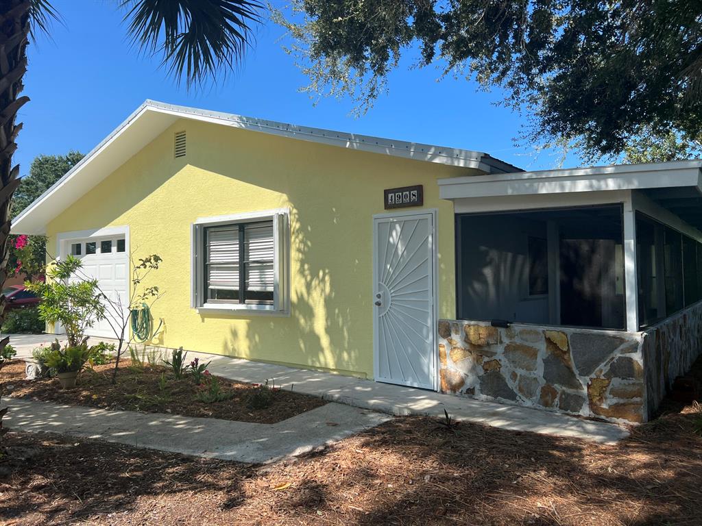 Photo of 4908 Sunset Boulevard Blvd, Fort Pierce, FL 34982 (MLS # R10826484)
