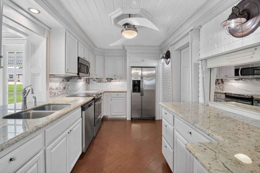Photo of 105 NW 8th Place, Boynton Beach, FL 33426 (MLS # B26018949)
