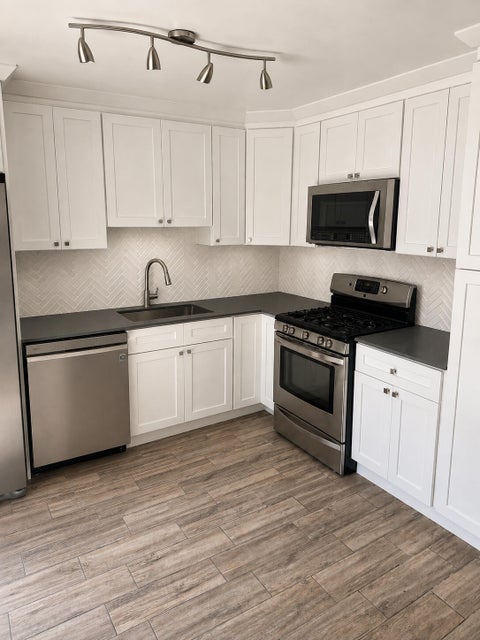 Photo of 2003 20TH Lane, Palm Beach Gardens, FL 33418 (MLS # B26071180)