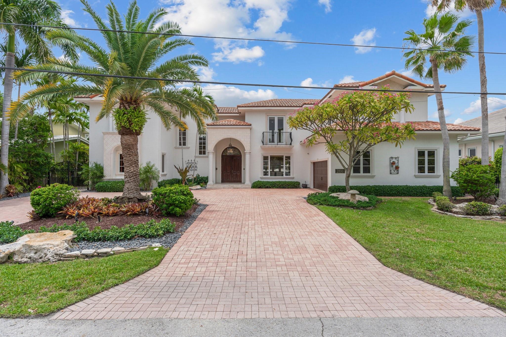 Discover A Stunning Retreat In Coral Ridge That Defines Deepwater Waterfront Living In Ft Laud! With 100' Of Just Added Raised Concrete Dockage Located 2nd From The Point, On A 115' Deep Lot w/Southern Exposure & Sweeping Views Of The 300' Wide Intracoastal Waterway! This Newer Estate Residence Is A Rare Find For This Premium Cul-De-Sac Location. Classic Interior Finishes, w/Formal Dining, Fireplace, A Chef’s Kitchen w/Wolf & Sub-Zero, Plus An Oversized Island For Entertaining & Casual Dining. 4 Spacious Br's, Large Bonus Loft, Plus Huge Primary Bedroom. Elegant Entertaining Spaces W/French Doors Everywhere Opening To A Fabulous
Expansive Outdoor Entertaining Pool Area w/ Poolside Firepit. Twin Pergolas, Covering Full Summer Kit & Dining, & Covering a Big Lounge Area. A 5000+SF Treasure!