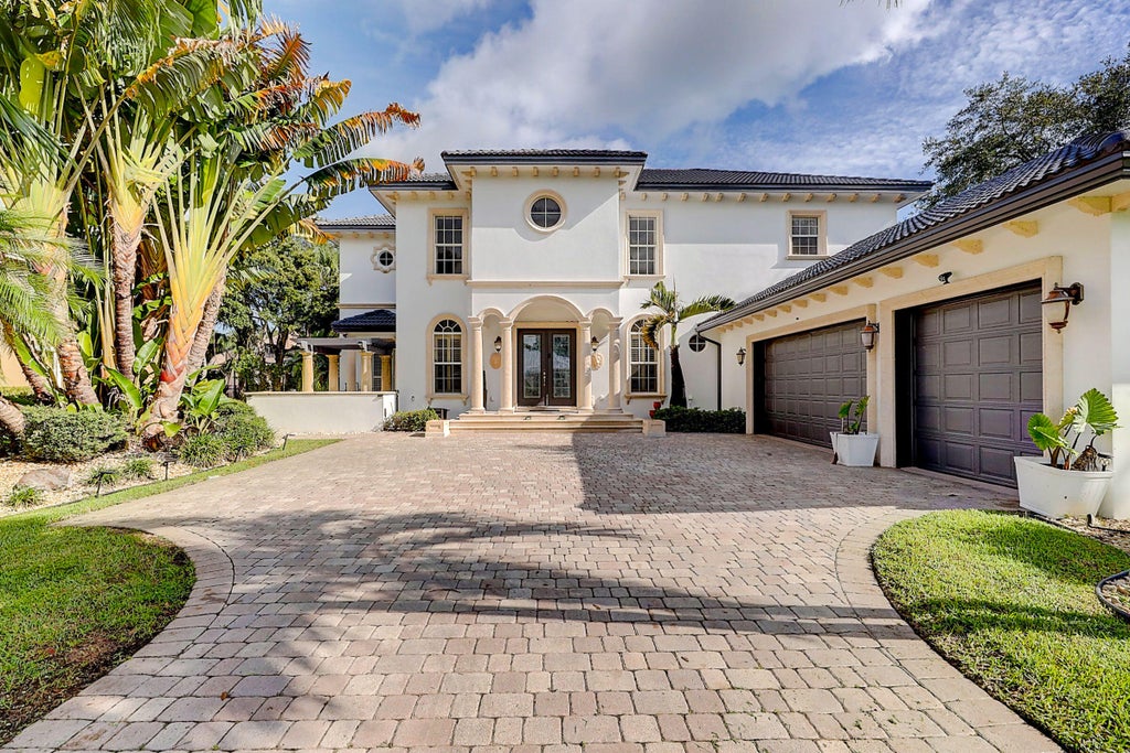 Photo of 2304 Winding Creek Lane, Fort Pierce, FL 34981 (MLS # B26042080)