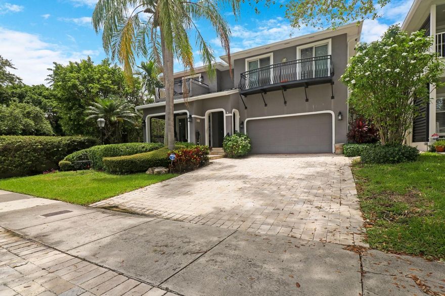 Sought after neighborhood of Rio Vista. This residence has spectacular water views. Formal living and dining rooms share a double-sided fireplace. The dining room boasts vaulted ceilings, open to the 2nd floor, offering lots of natural light. Spacious kitchen with a center island, natural gas range, pantry and breakfast nook. Primary suite has dual walk-in closets, 2 terraces with water views and a sitting room that might serve as a nursery, office, dressing room, gym. Enjoy the balmy breezes on the 2nd floor screened terrace overlooking the pool. The backyard is made for entertaining with a covered terrace running the length of the house. Potential for dockage across the street with exclusive use by permit holder.