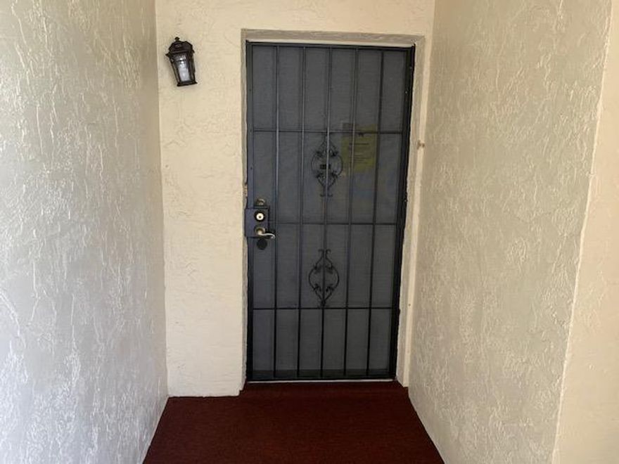 END UNIT CONDO WITH LAKE VIEWS HAS 2 BEDROOMS (DEN CONVERTED INTO BEDROOM) AND 1 1/2 BATHS PLUS 2 BALCONIES! GATED COMMUNITY WITH CLUBHOUSE AND POOL! GREAT LOCATION JUST MINUTES TO LONGWOOD HOSPITAL, SHOPPING, RESTAURANTS AND BEACHES. NEED SOME LOVING FROM NEW OWNER. CALL FOR YOUR PRIVATE SHOWING TODAY!