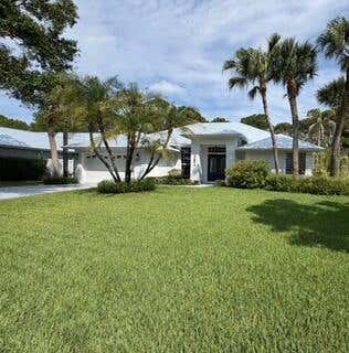 Photo of 3694 SW Woodbriar Lane, Palm City, FL 34990 (MLS # B26050174)