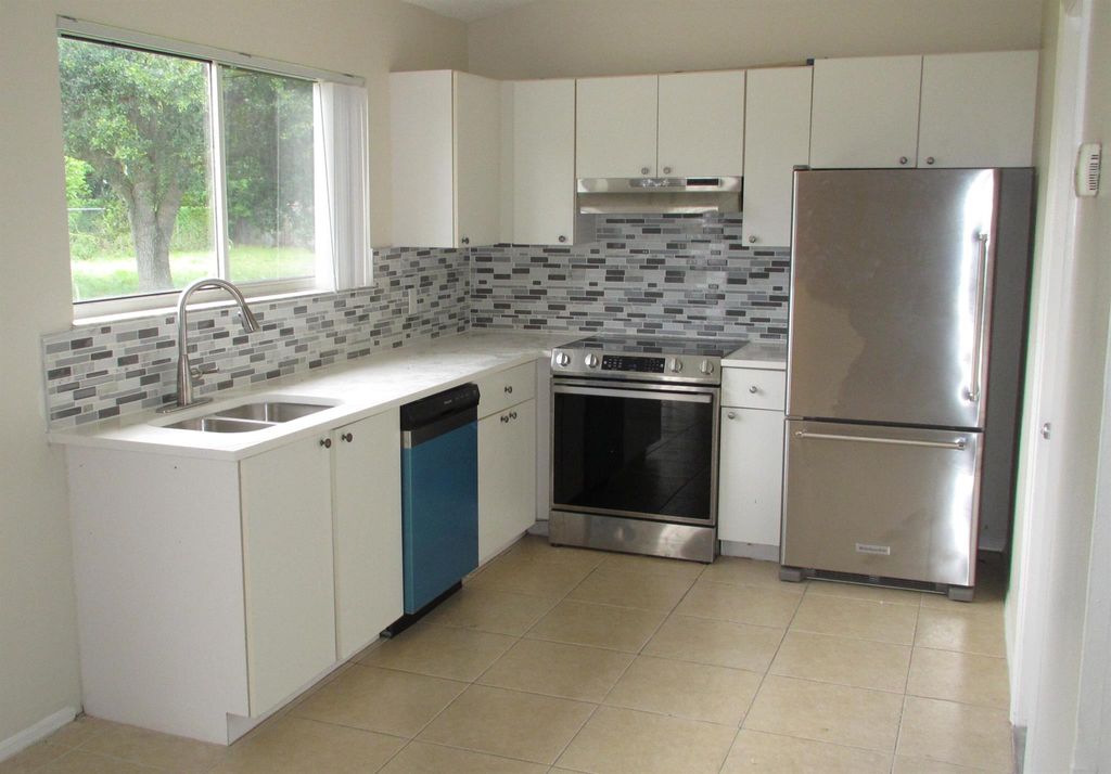 Photo of 2832 SW Ann Arbor Road, Port Saint Lucie, FL 34953 (MLS # R11112951)