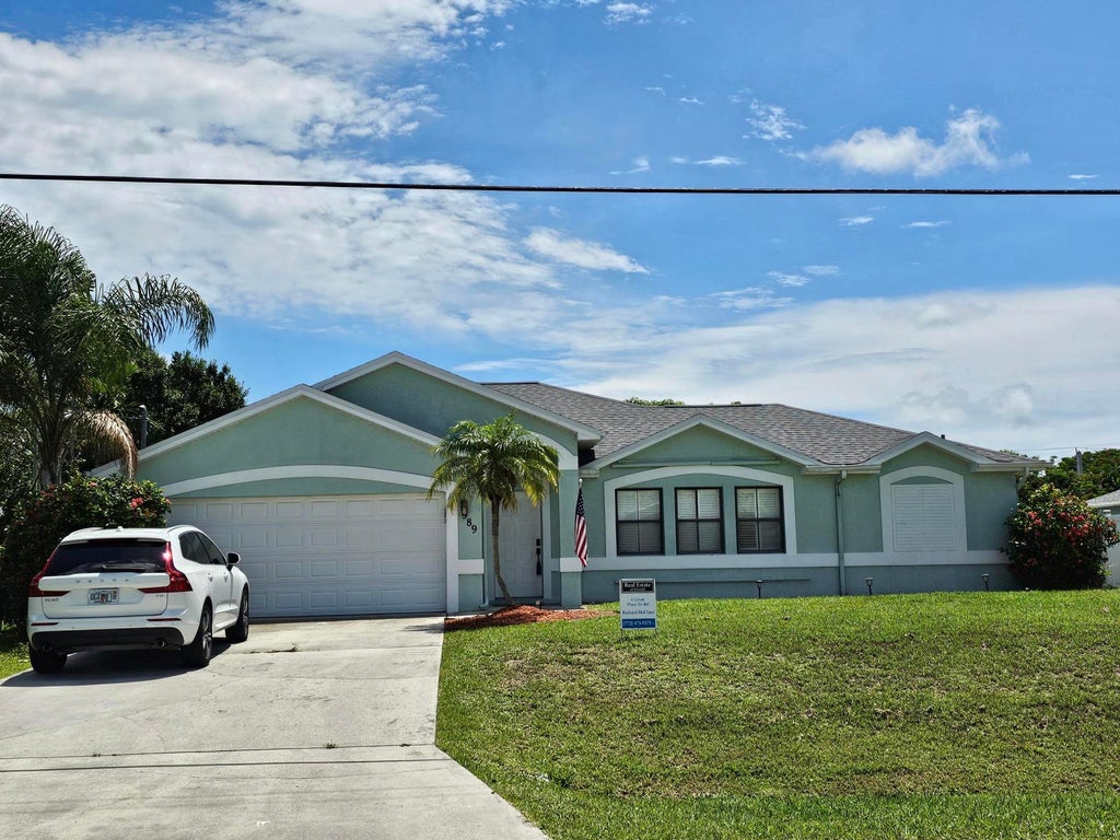 Photo of 389 SE Whitmore Drive, Port Saint Lucie, FL 34984 (MLS # R11095238)