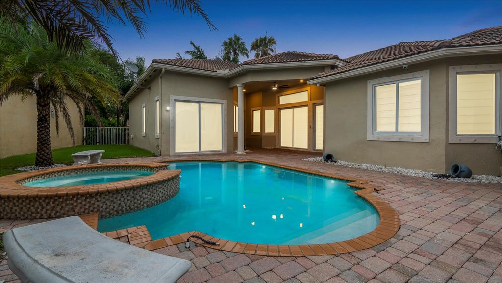 Photo of 5843 NW 123rd Avenue, Coral Springs, FL 33076 (MLS # F10524760)