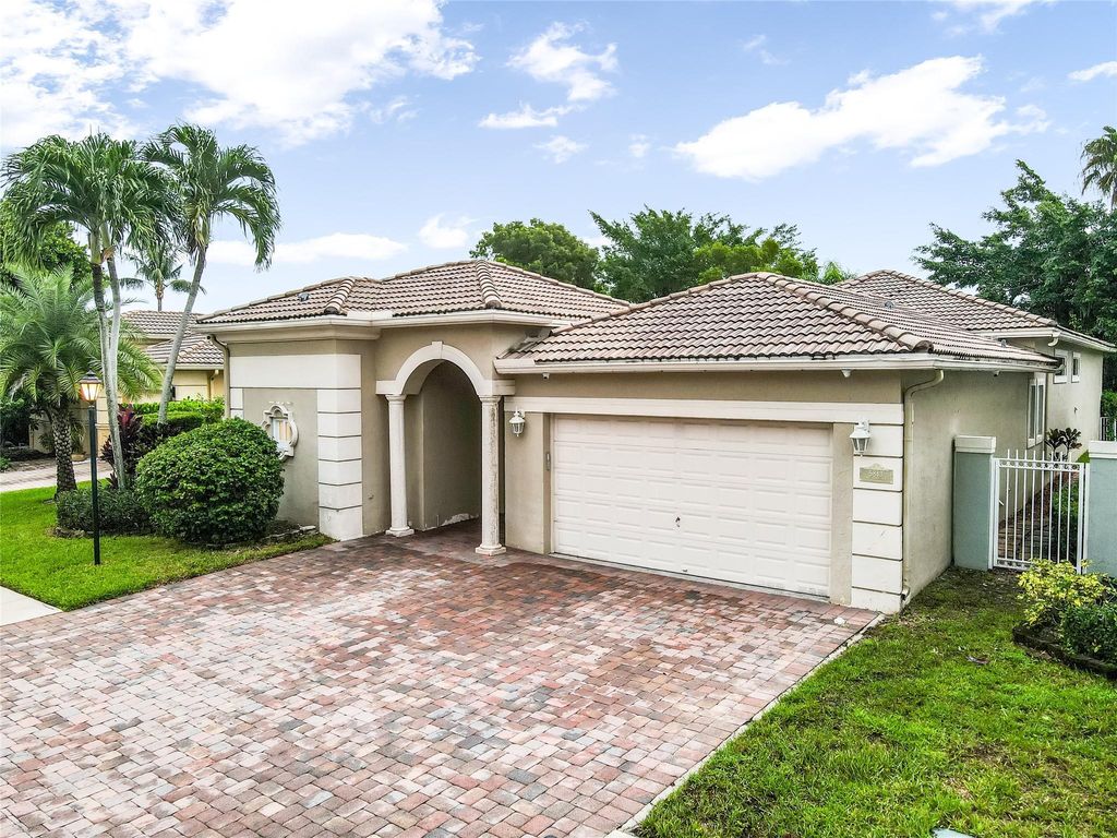 Photo of 5843 NW 123rd Avenue, Coral Springs, FL 33076 (MLS # F10524760)