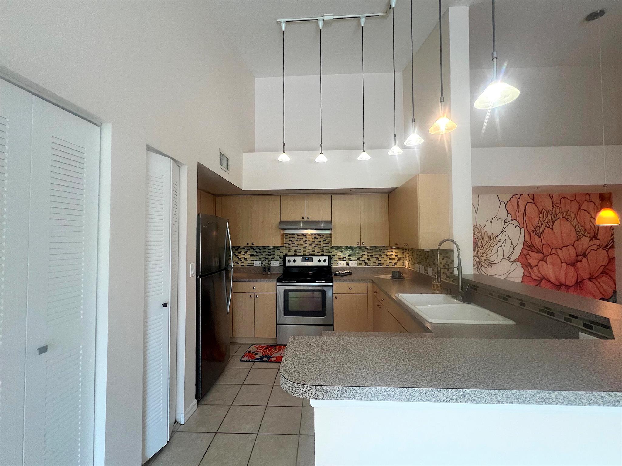 Resort-style gated community just minutes from the beach and everyday conveniences.Spacious 3rd-floor apartment featuring 2 bedrooms and 2 full bathrooms. Enjoy a bright eat-in kitchen and wood floors throughout. Sliding doors open to a private covered veranda. In-unit laundry included. Secure building with on-site management.Amenities include a heated pool, hot tub, clubhouse, gym, basketball and volleyball courts, and a BBQ area by the pool. Ideally located near I-95, shopping, dining, and just minutes from Atlantic Avenue in downtown Delray Beach.