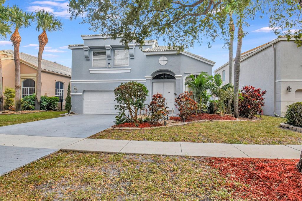 Photo of 7598 Downwinds Lane, Lake Worth, FL 33467 (MLS # R11045384)